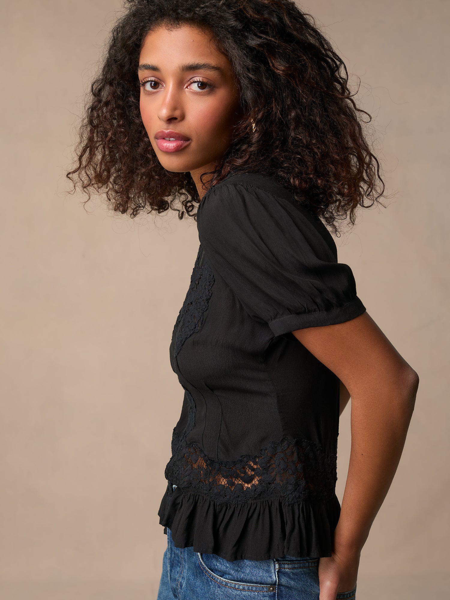 Flowy black embroidered top with ruffles | Rouje